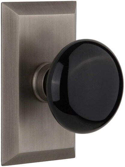 New York Rosette Door Set with Black Porcelain Knobs in Antique Pewter.